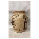 Vase with Kokopelli dancing figures.
