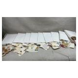 Collection of Vtg stamps on paper