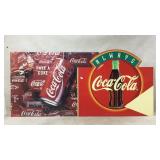 Two Coca-Cola Advertising Signs