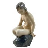 ROYAL COPENHAGEN 'GIRL ON STONE' PORCELAIN FIGURE