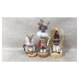 Three handcrafted Kachina-style figurines