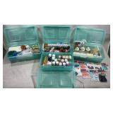 Small containers filled with various craft