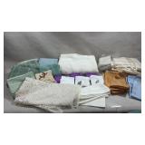 assortment of home textiles and linens, f