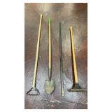 assortment of four long-handled garden and
