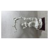 large vintage resin sculpture titled 'The Swing'