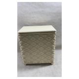Small vintage white woven laundry hamper with a