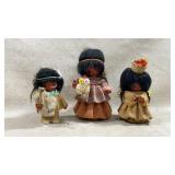 vintage handcrafted souvenir dolls that closely
