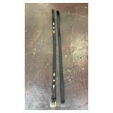 two black leather belts with silver-tone metal