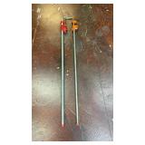 2 adjustable pipe clamps