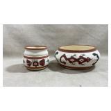 two hand-painted artist signed ceramic pieces in a