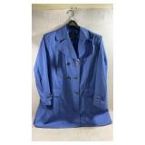 bright blue double-breasted trench coat with a