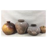 Four Decorative Handmade Pottery Vessels