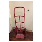 standard red metal hand truck