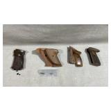 collection of replacement pistol grips and small