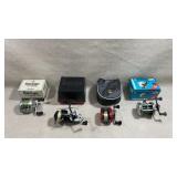 collection of vintage fishing reels and