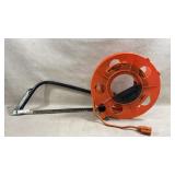 Extension cord in reel, metal-frame bow saw