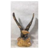 Wood eagle sculpture