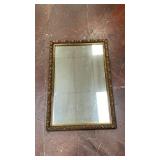 ornate, rectangular giltwood and gesso wall