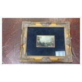 framed landscape print set inside a large,