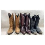 three pairs of classic leather cowboy boots in