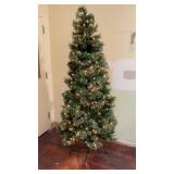 pre-lit artificial Christmas tree with soft, w