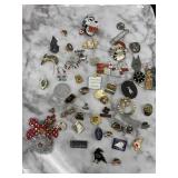 SELECTION OF PINS AND BROOCHES