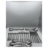 SET OF STAINLESS FLATWARE MISSING ONE TEASPOON