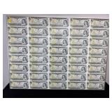 FRAMED SHEET OF UNCUT UNCIRCULATED $1.00 BILLS