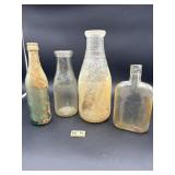 4 OLD BOTTLES FOUND WHILE DIVING