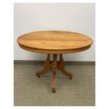 PINE VINTAGE OVAL TABLE ON CASTERS