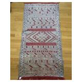 HAND WOVEN RUG
