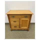 VINTAGE THREE DRAWER ONE DOOR CABINET ON CASTERS