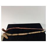 PAIR OF HAND CARVED WALKING STICKS