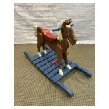 CARVED CHILDS ROCKING HORSE