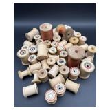SELECTION OF WOODEN SPOOLS AND THREAD