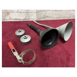 2 FUNNELS AND 3 OIL FILTER WRENCHES