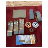 ASSORTMENT OF BELT SANDER BELTS AND GRINDING DISCS