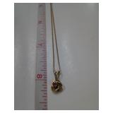 10 KT GOLD CHAIN WITH A RUBY PENDANT