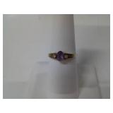 10 KT GOLD AND AMETHYST RING WITH DIAMOND SIDES
