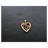 14KT YELLOW GOLD HEART PENDANT WITH 3 RUBIES