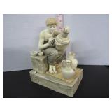 IMPRESSED FIGURINE OF GRECO-ROMAN SEATED POTTER