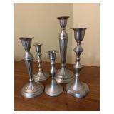 5 STAGGERED PEWTER CANDLESTICKS