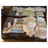 LOT OF DOILES, APRONS ETC