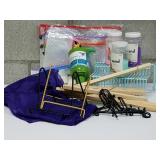 BOX LOT- Easels, Sand, Risers, Curtains and more