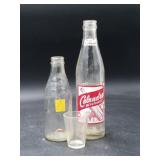 Vintage Soda Bottles and Measuring Glass