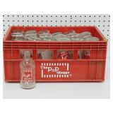 Crate filled with The Pop Shoppe Soda Bottles