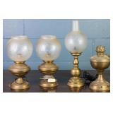 FOUR VINTAGE BRASS OIL LAMPS