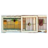 THREE CONTINENTAL STAINED GLASS PANELS