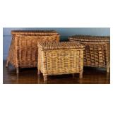 THREE HAND-WOVEN WICKER LAUNDRY BASKETS