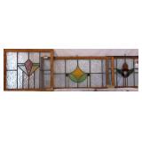 THREE CONTINENTAL STAINED GLASS PANELS